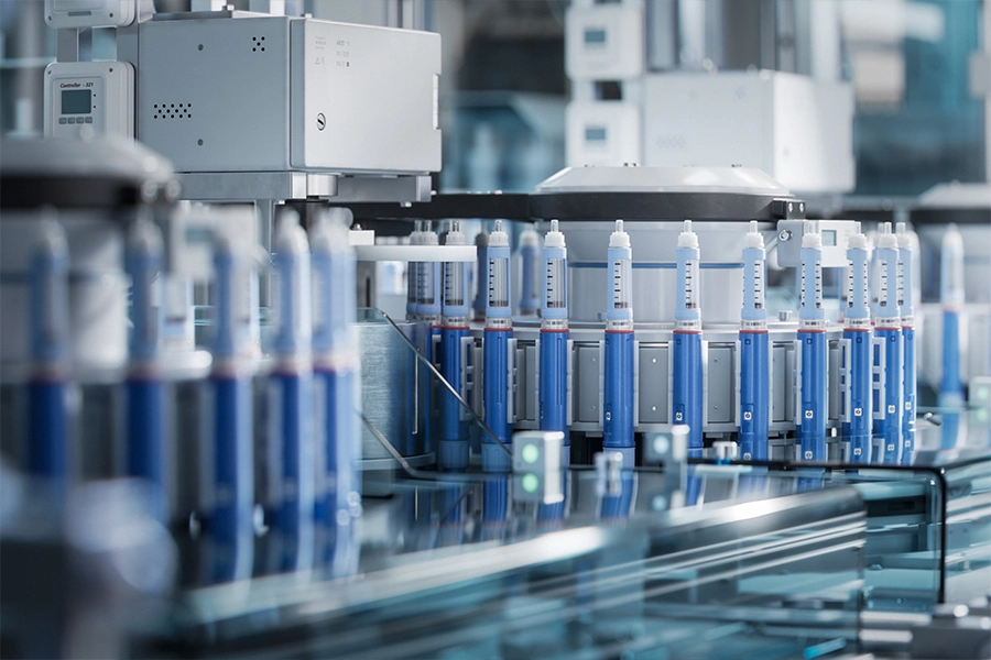Insulin Injection Pens on Conveyor Line during Production Process 